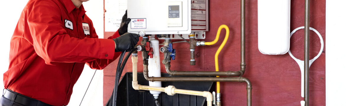 Plumber Working on a Tankless Water Heater