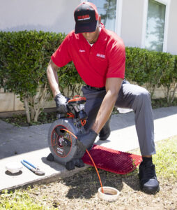 Plumber Working on Drain Cleaning